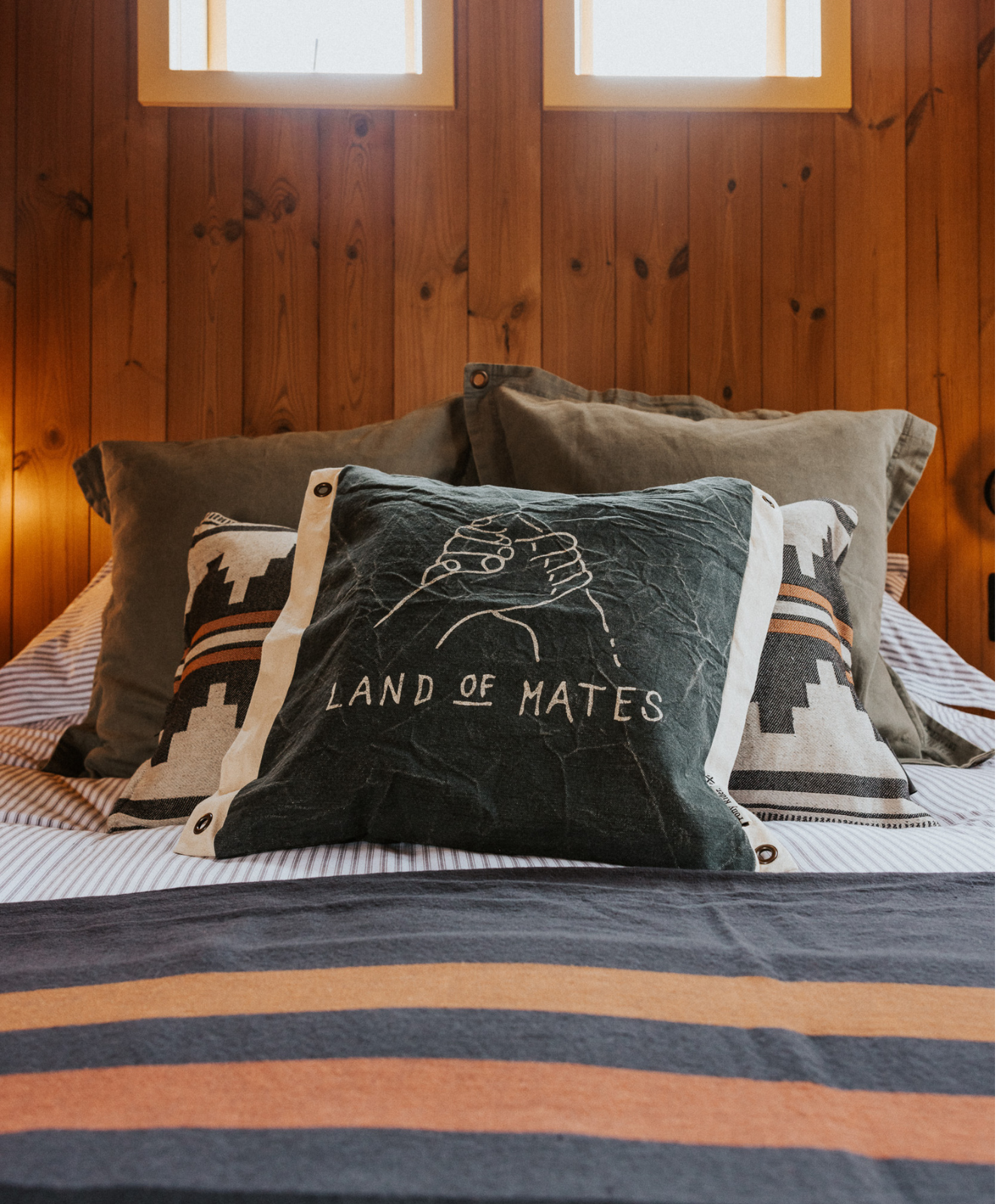 Land of Mates Cushion X Banner | Charcoal